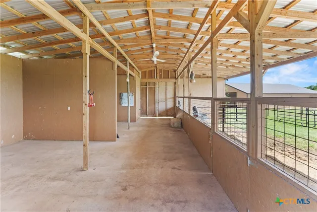 a view of a room with a large window