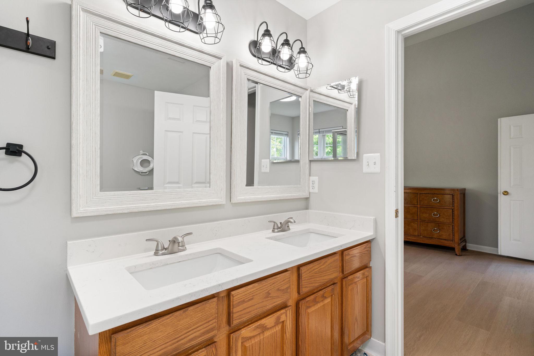 21654 Frame Square Broadlands, VA 20148 - Photo 36 of 43 Bright and airy dual-sink bathroom.