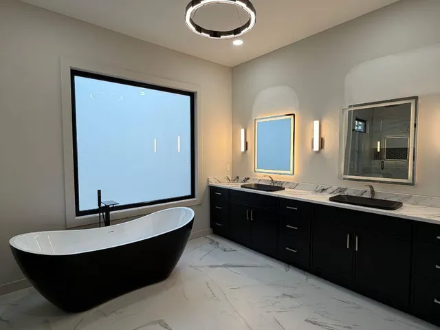 a room with two mirror and window