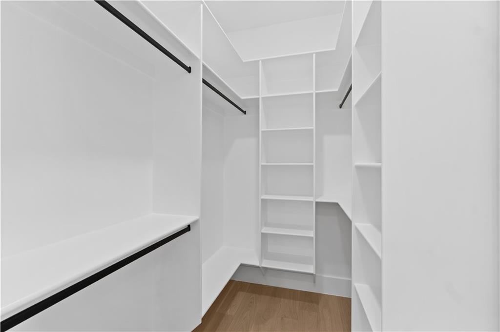 2701 Collins Hill Road Lawrenceville, GA 30043 - Photo 48 of 67 a view of walk in closet with empty racks