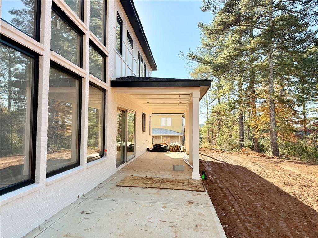 2701 Collins Hill Road Lawrenceville, GA 30043 - Photo 6 of 67 a view of a house with a outdoor space