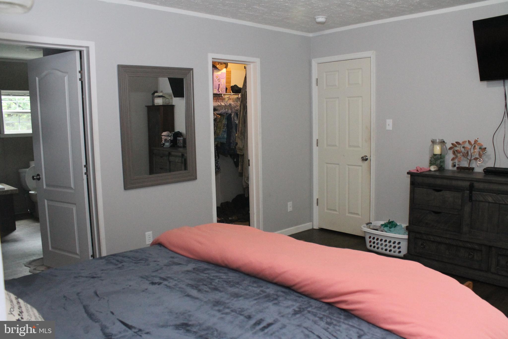 598 County Rte 1/1 Berkeley Springs, WV 25411 - Photo 13 of 25 Primary Bedroom