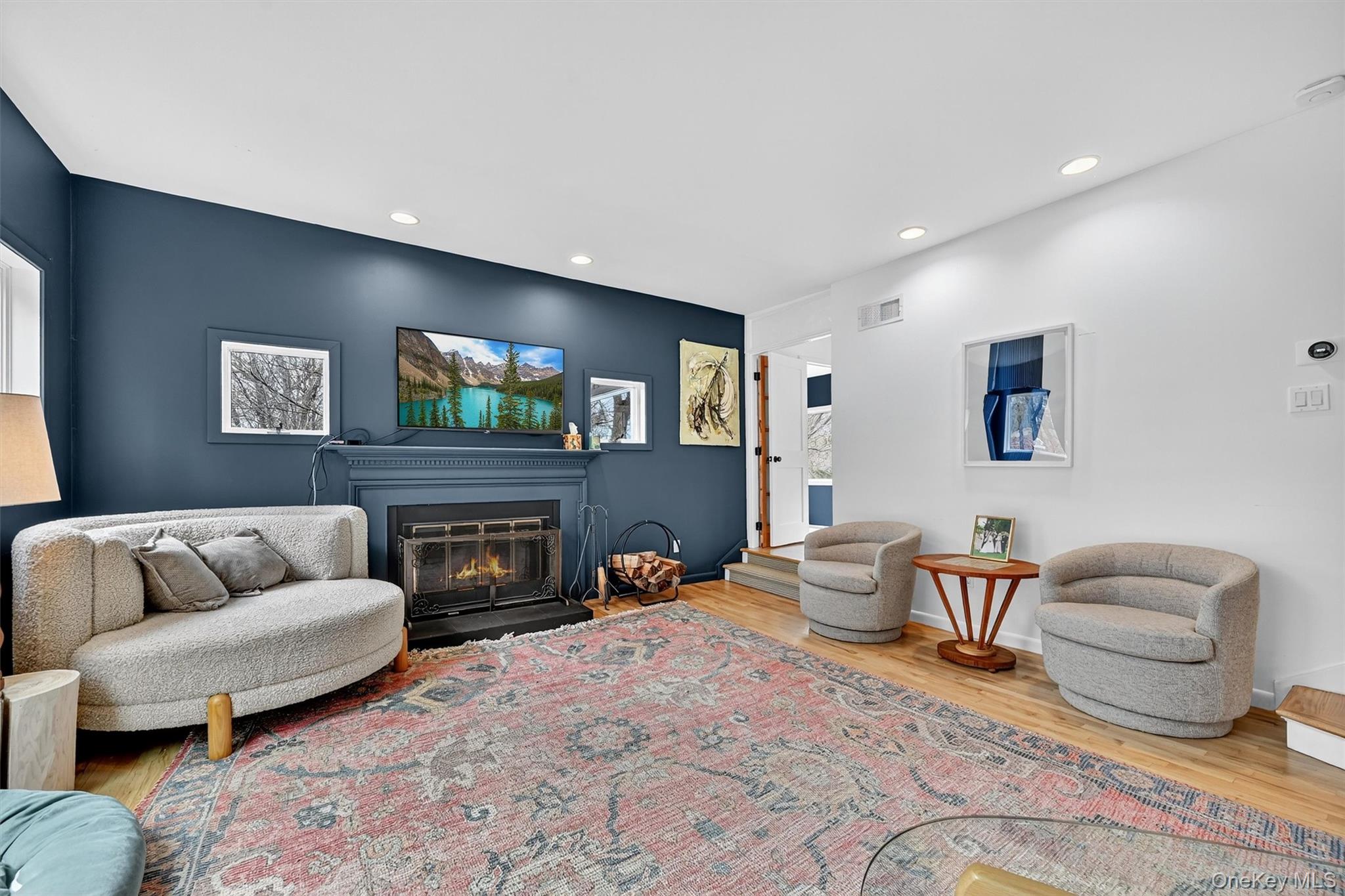 16 Oxford Springs Road Chester, NY 10918 - Photo 11 of 48 a living room with furniture a couch and a fireplace