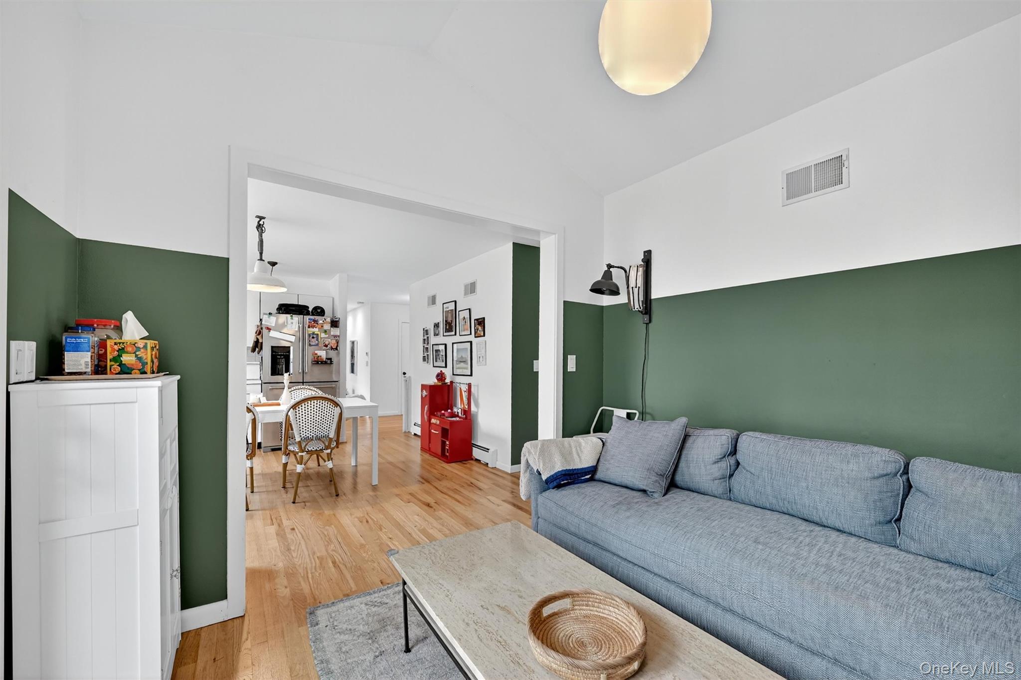 16 Oxford Springs Road Chester, NY 10918 - Photo 17 of 48 a living room with furniture and a wooden floor