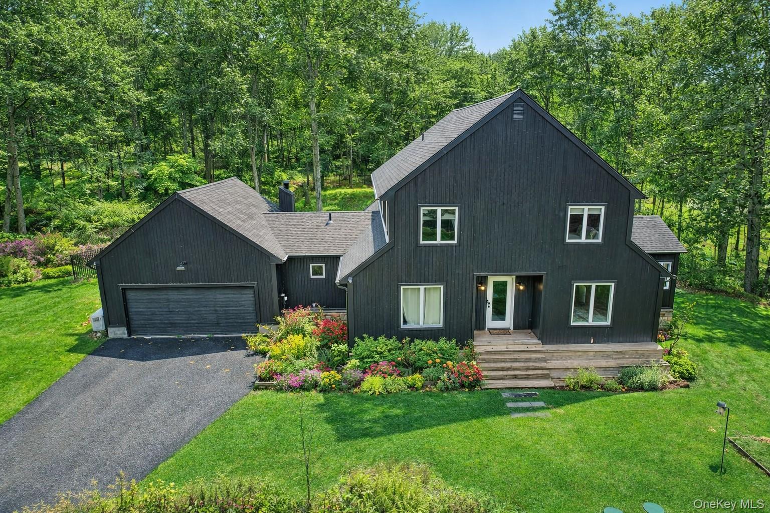 16 Oxford Springs Road Chester, NY 10918 - Photo 2 of 43 a house view with a garden space
