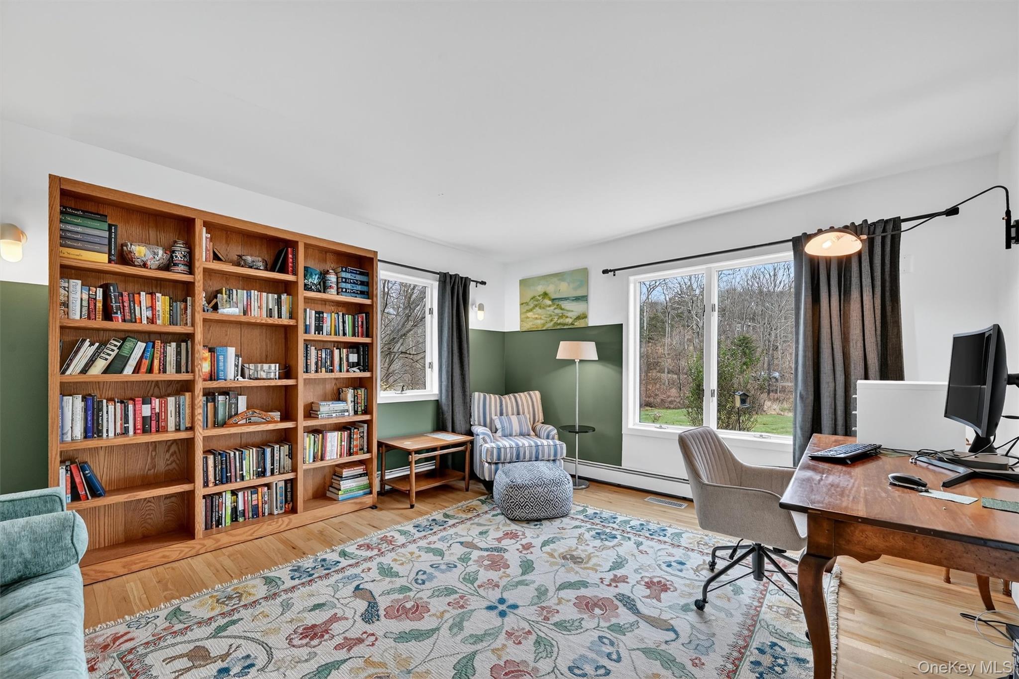 16 Oxford Springs Road Chester, NY 10918 - Photo 22 of 48 a living room with furniture and a book shelf