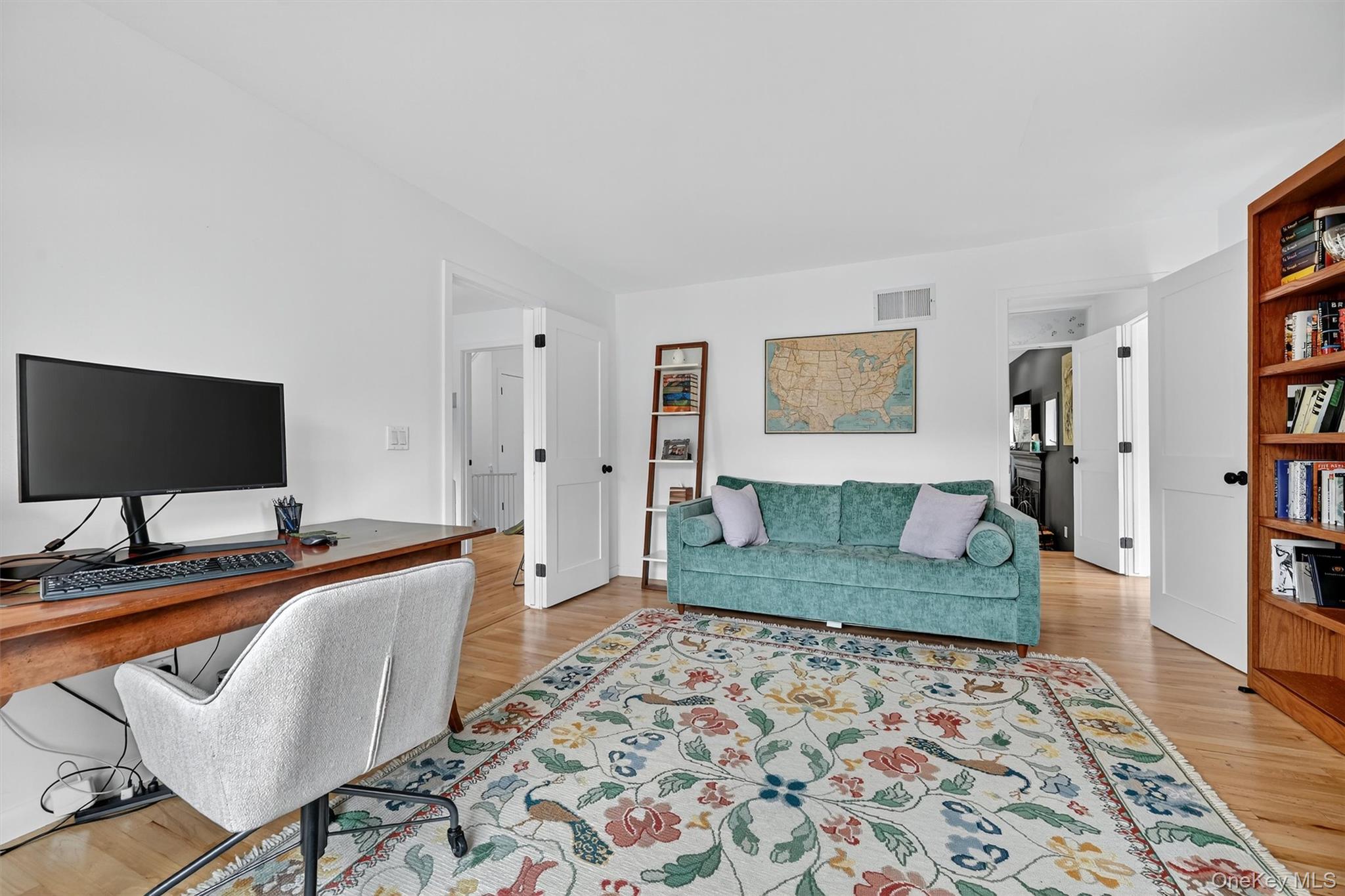 16 Oxford Springs Road Chester, NY 10918 - Photo 23 of 48 a living room with furniture and a flat screen tv