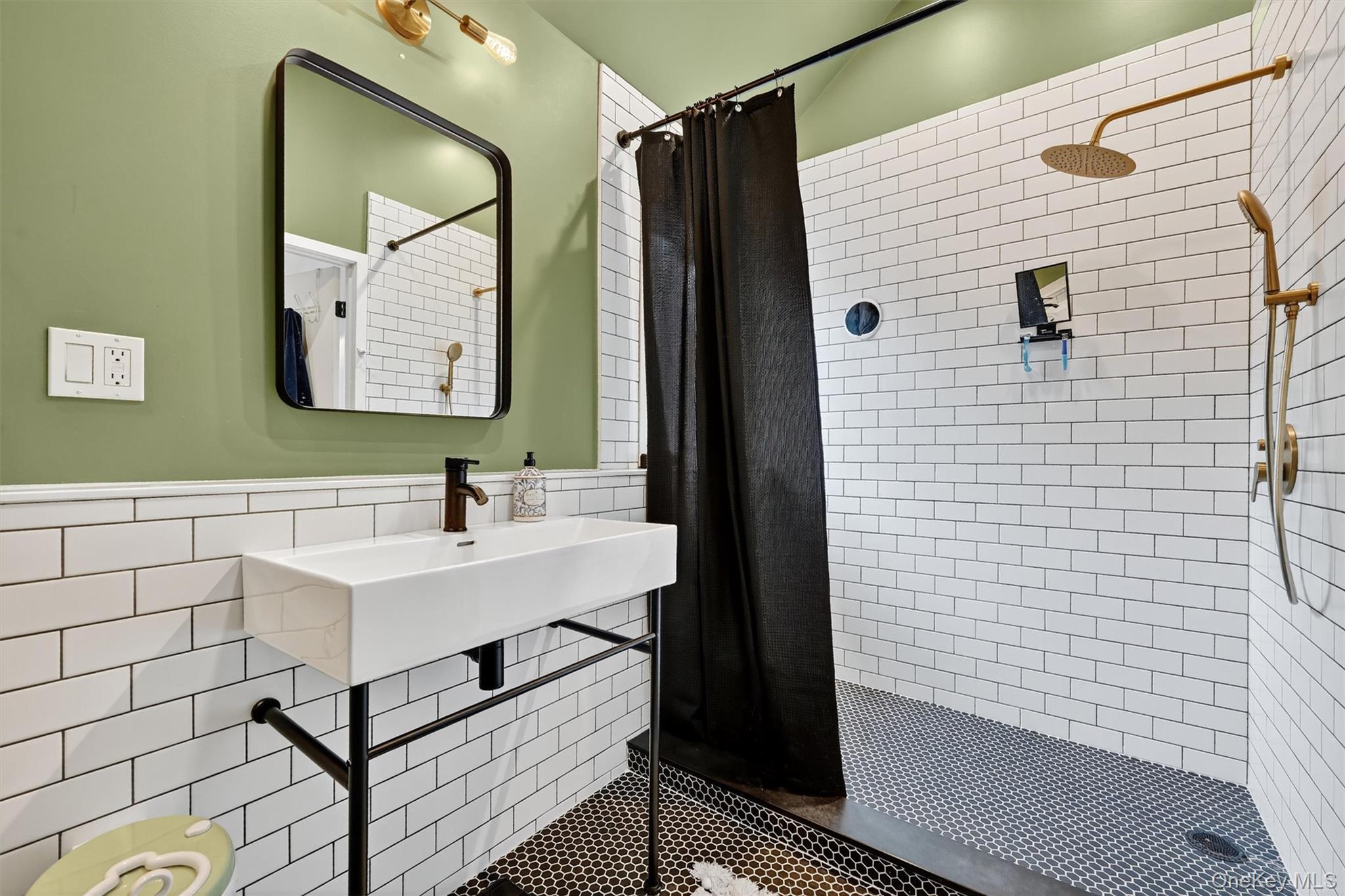 16 Oxford Springs Road Chester, NY 10918 - Photo 30 of 48 a bathroom with a sink mirror and a shower