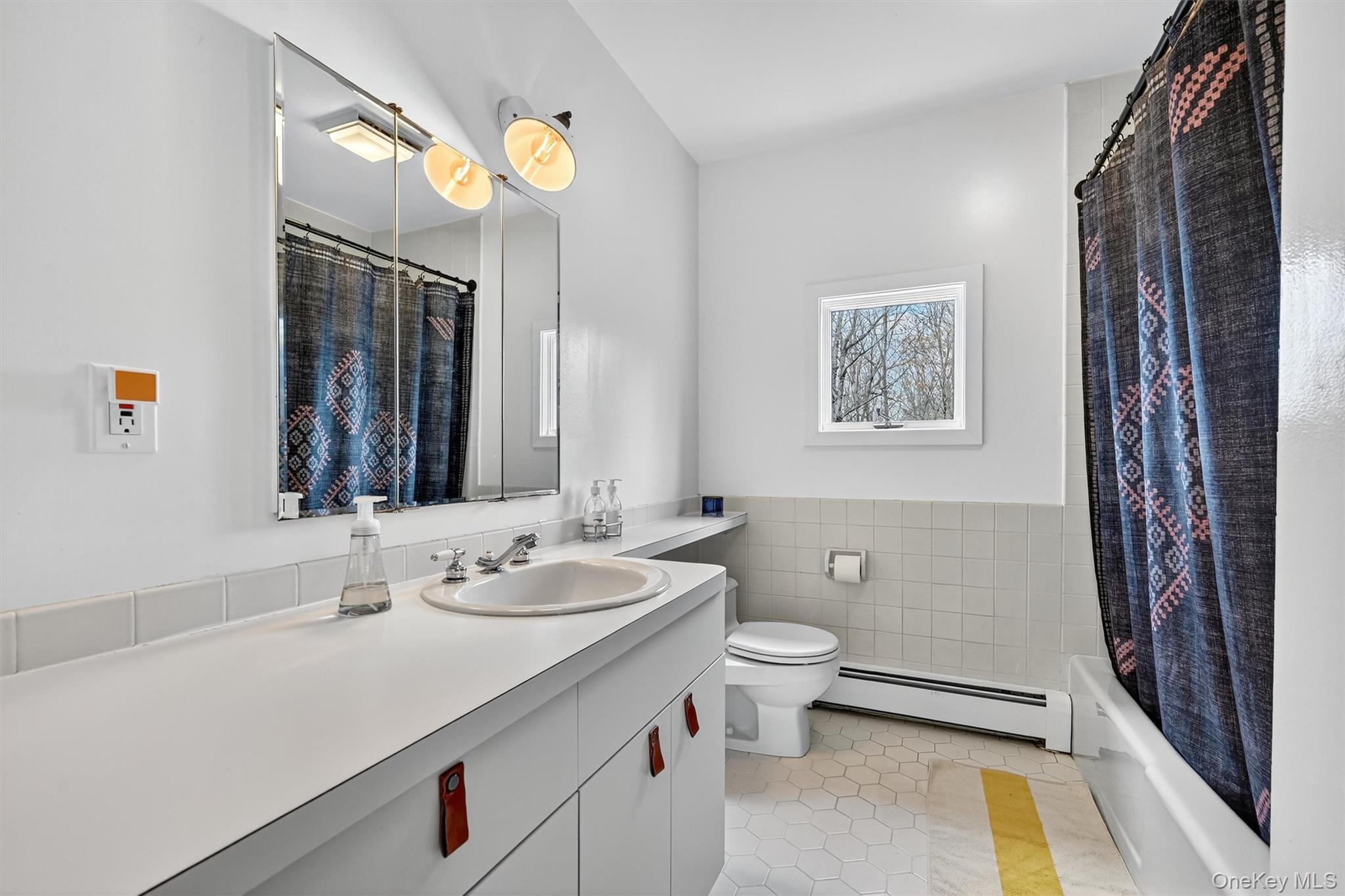 16 Oxford Springs Road Chester, NY 10918 - Photo 32 of 48 a bathroom with a granite countertop sink toilet and shower