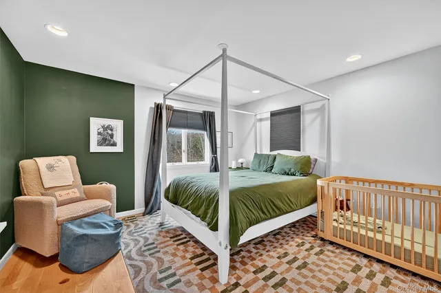 a view of a chairs and table in patio with wooden floor