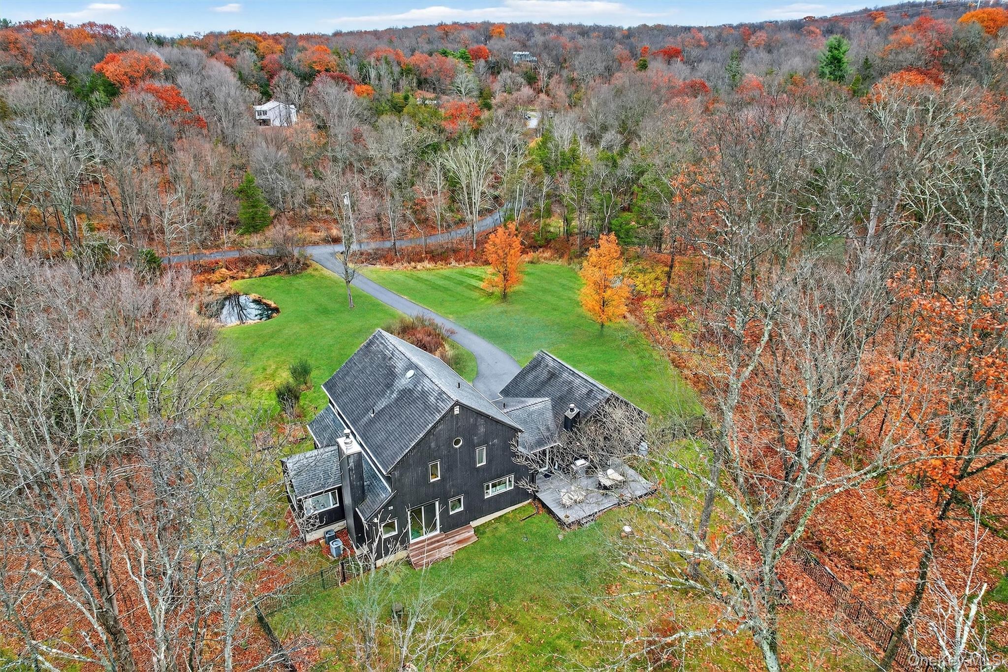 16 Oxford Springs Road Chester, NY 10918 - Photo 38 of 48 an aerial view of a house with a yard basket ball court and outdoor seating
