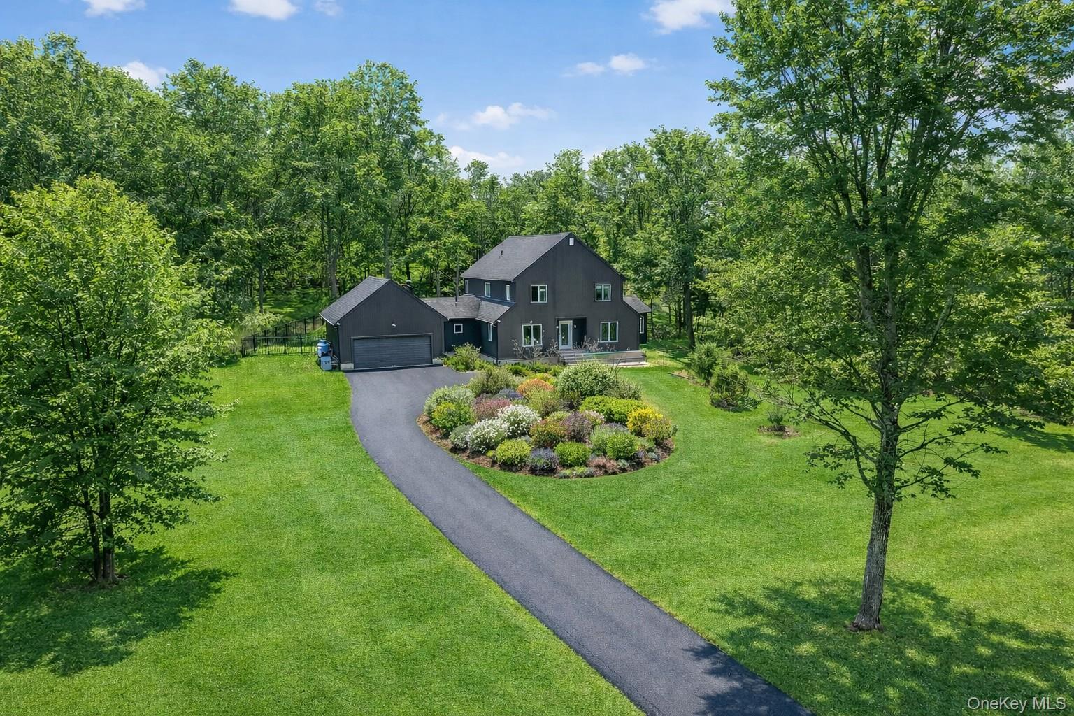 16 Oxford Springs Road Chester, NY 10918 - Photo 40 of 43 a front view of a house with a yard