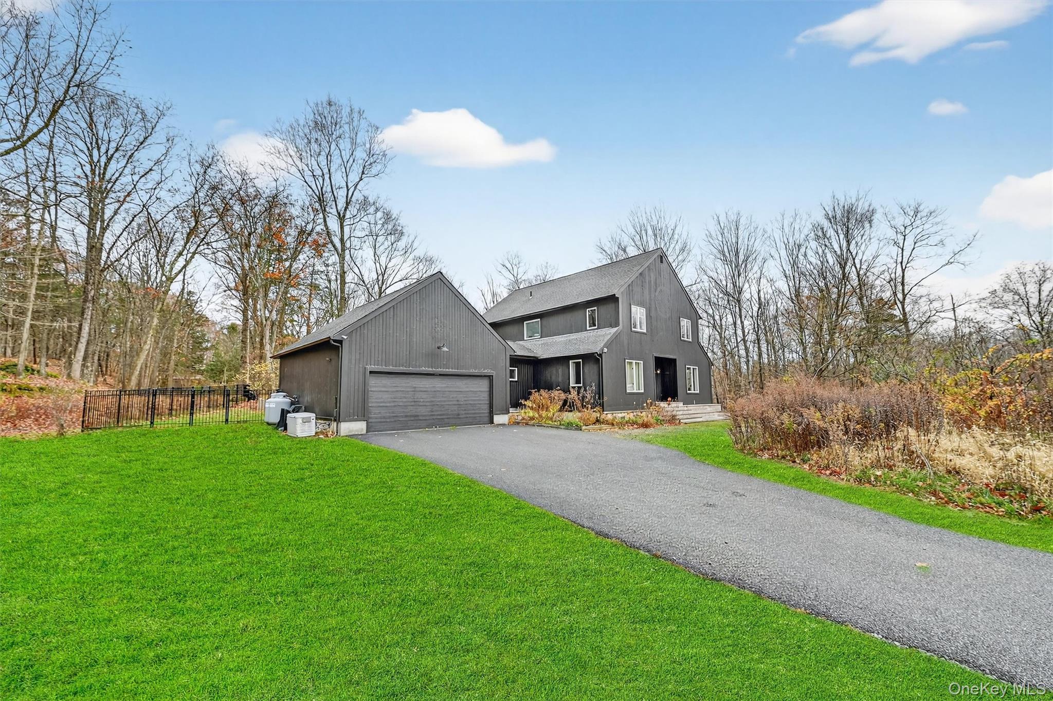 16 Oxford Springs Road Chester, NY 10918 - Photo 41 of 48 a front view of house with yard and green space
