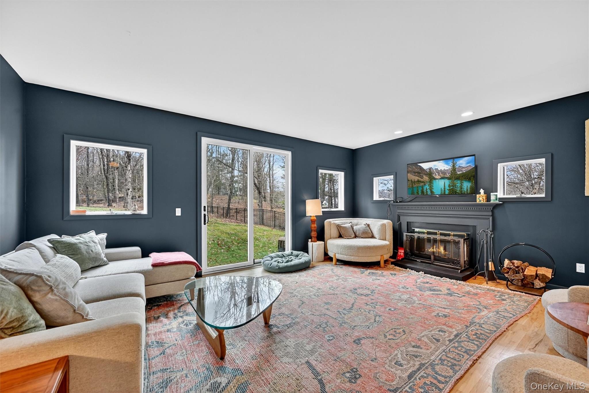 16 Oxford Springs Road Chester, NY 10918 - Photo 6 of 48 a bedroom with furniture and a fireplace