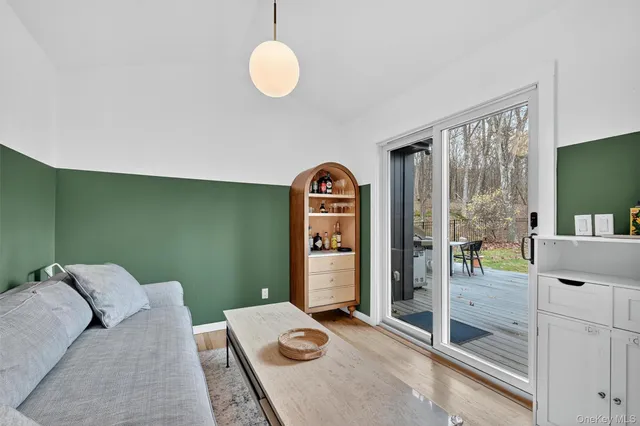 a bed room with a bed and a television