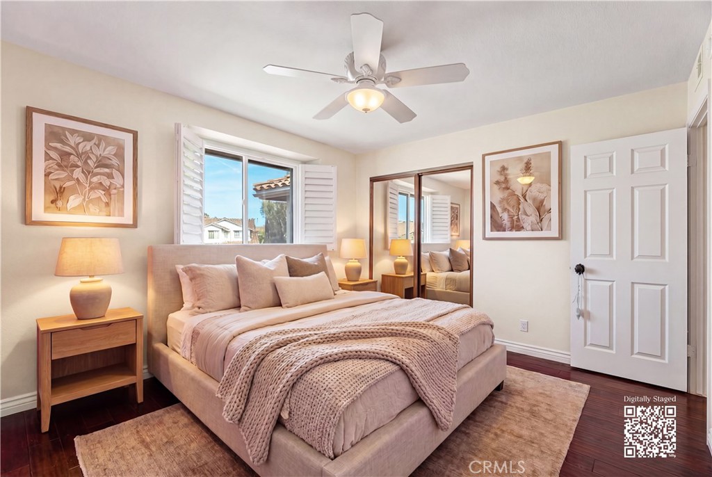 21732 Exton Way Lake Forest, CA 92630 - Photo 32 of 52 Top floor bedrooms with ceiling fan and wooden shutters. room virtually staged, find originals here https://bit.ly/3OvKmPn