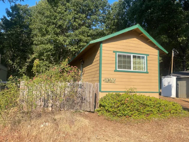 a view of backyard of house