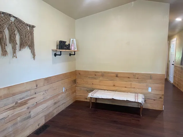 a workspace with furniture and window