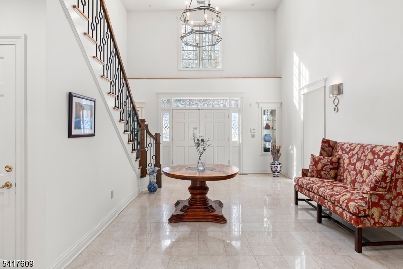 2 Cobblefield Road Mendham, NJ 07945 - Photo 3 of 50 a living room with furniture and a chandelier