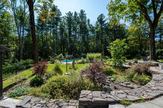 a view of swimming pool with a patio