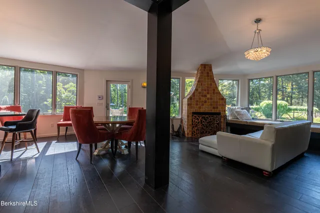 a bath tub sitting next to a window