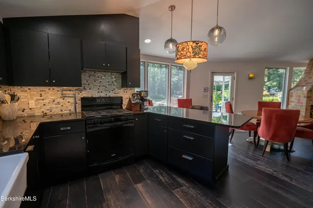 a bathroom with a toilet and shower