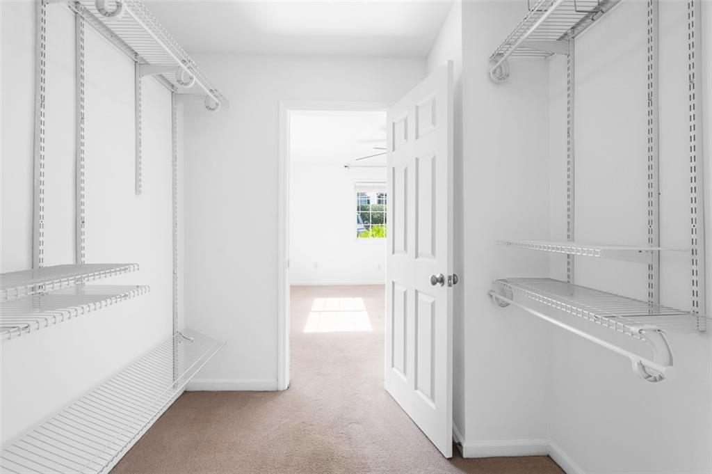 1468 Briarwood Road Northeast, Unit 602 Atlanta, GA 30319 - Photo 23 of 30 a bathroom with a shower and a sink