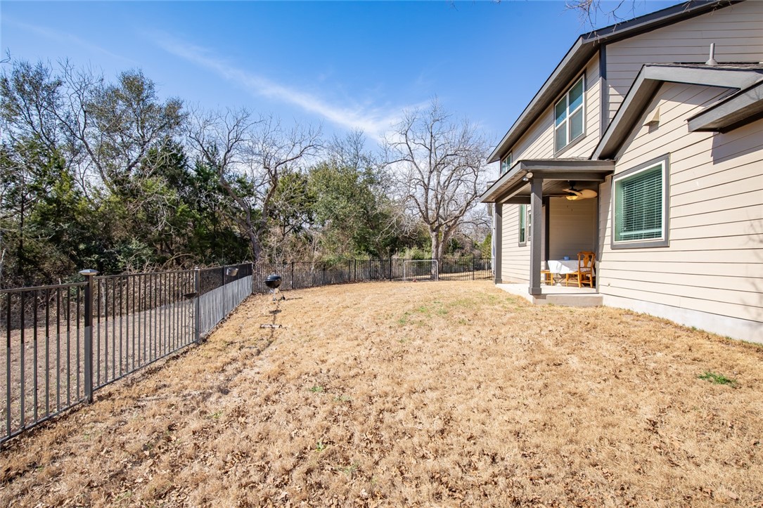 9707 McKnight Loop Austin, TX 78717 - Photo 17 of 17 a view of a backyard of the house