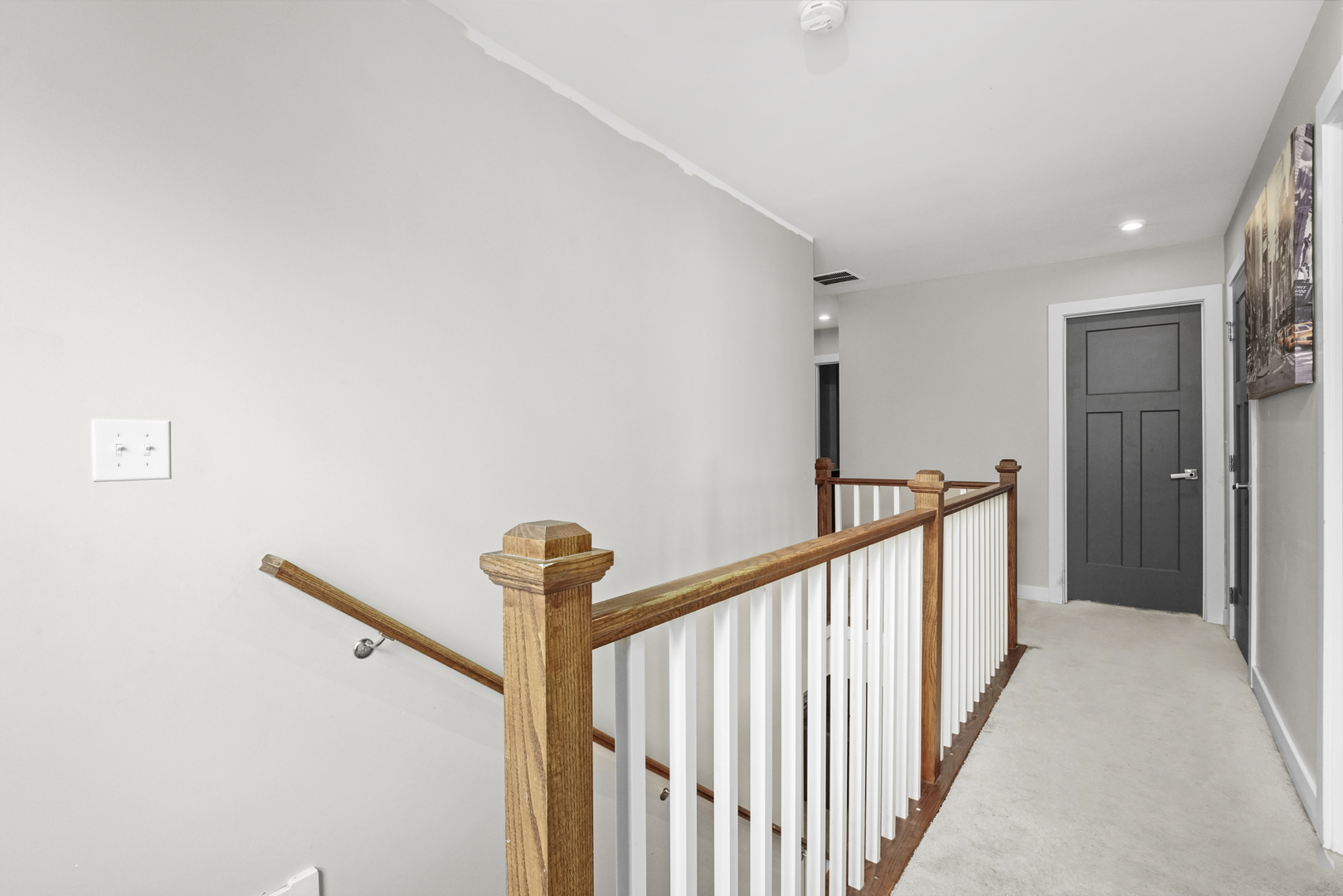 3413 Forestview Drive Joliet, IL 60431 - Photo 13 of 32 a view of a hallway with a staircase