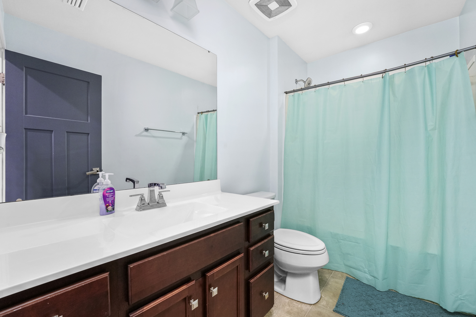 3413 Forestview Drive Joliet, IL 60431 - Photo 19 of 32 a bathroom with a sink vanity mirror and toilet