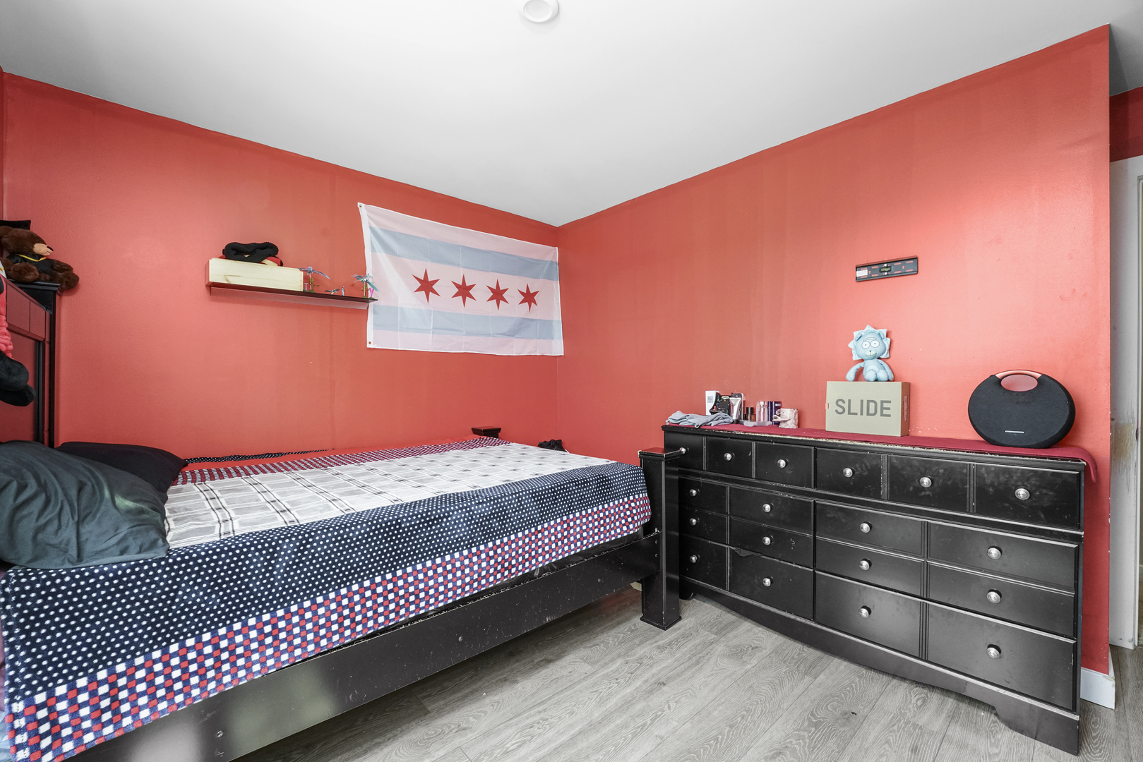 3413 Forestview Drive Joliet, IL 60431 - Photo 22 of 32 a bed room with a bed and a dresser