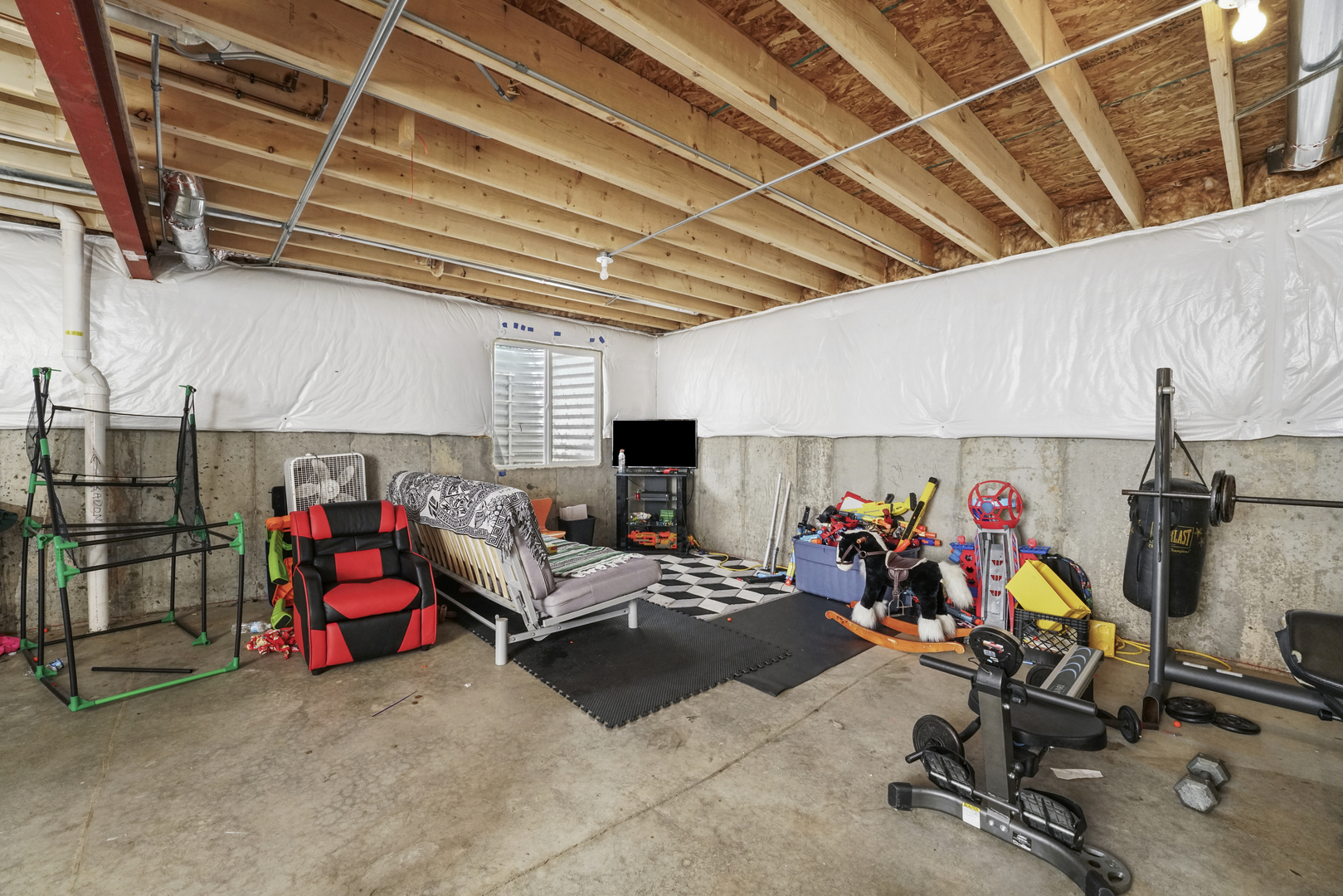 3413 Forestview Drive Joliet, IL 60431 - Photo 24 of 32 a view of a room with gym equipment