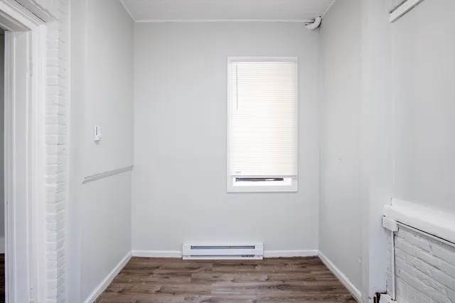 a view of a room that has a window