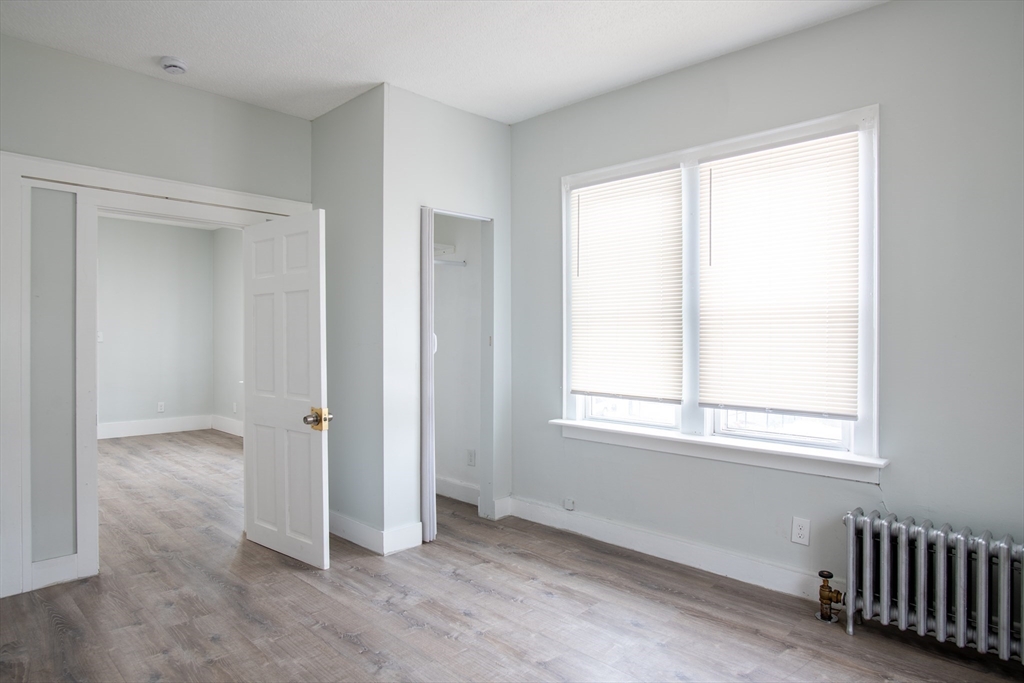 69 Winter Street Springfield, MA 01105 - Photo 21 of 36 an empty room with windows
