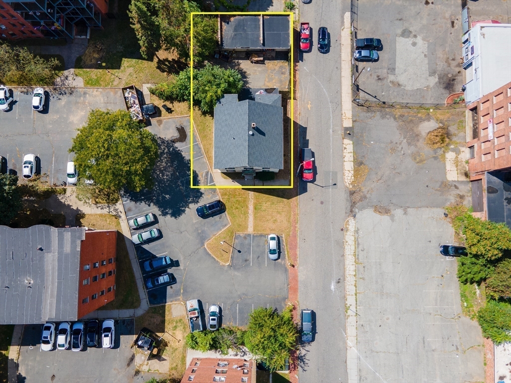 69 Winter Street Springfield, MA 01105 - Photo 4 of 36 an aerial view of residential houses with outdoor space