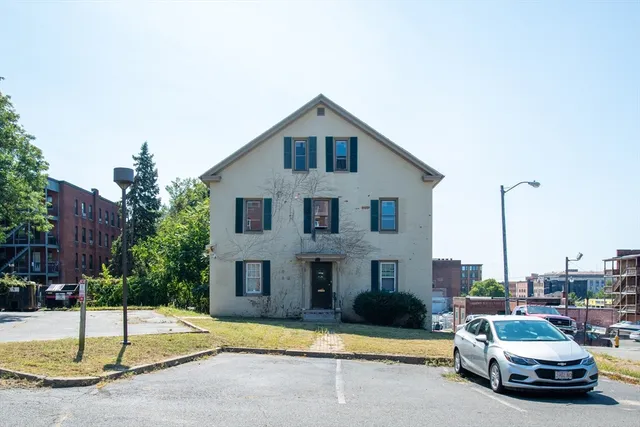a car parked in front of a house
