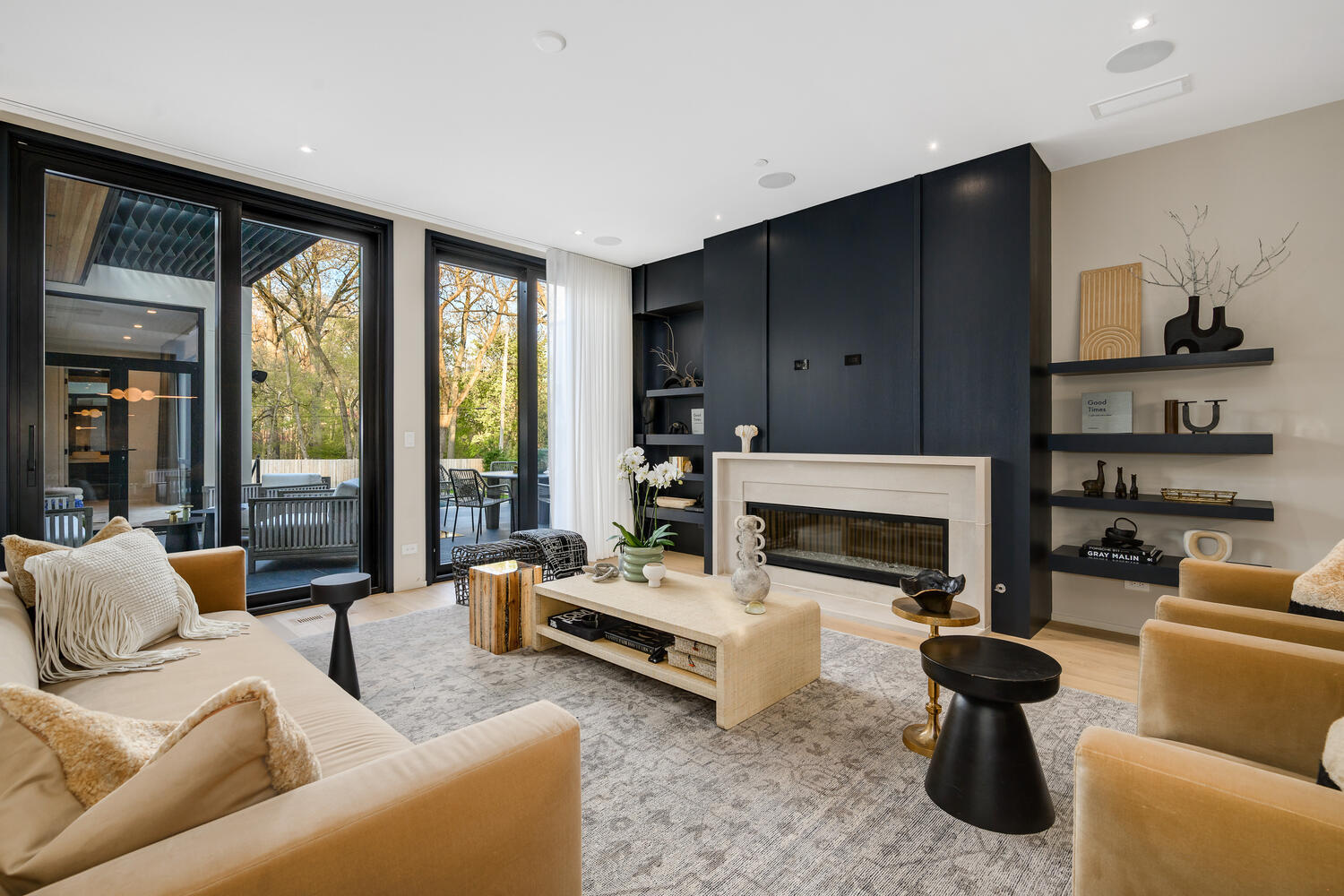 921 Sheridan Road Glencoe, IL 60022 - Photo 14 of 51 a living room with furniture fireplace and a large window