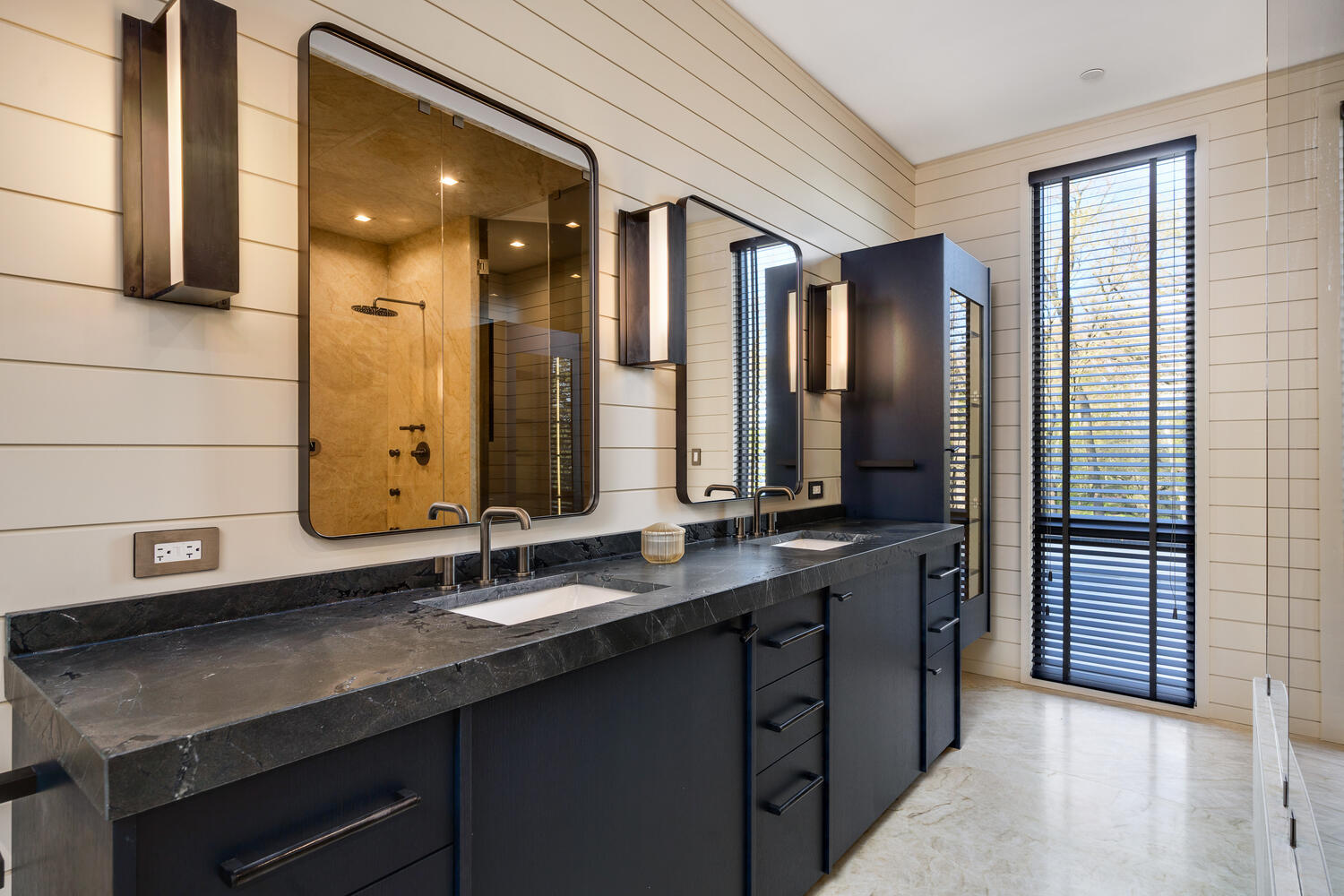 921 Sheridan Road Glencoe, IL 60022 - Photo 21 of 51 a bathroom with a double vanity sink and a mirror