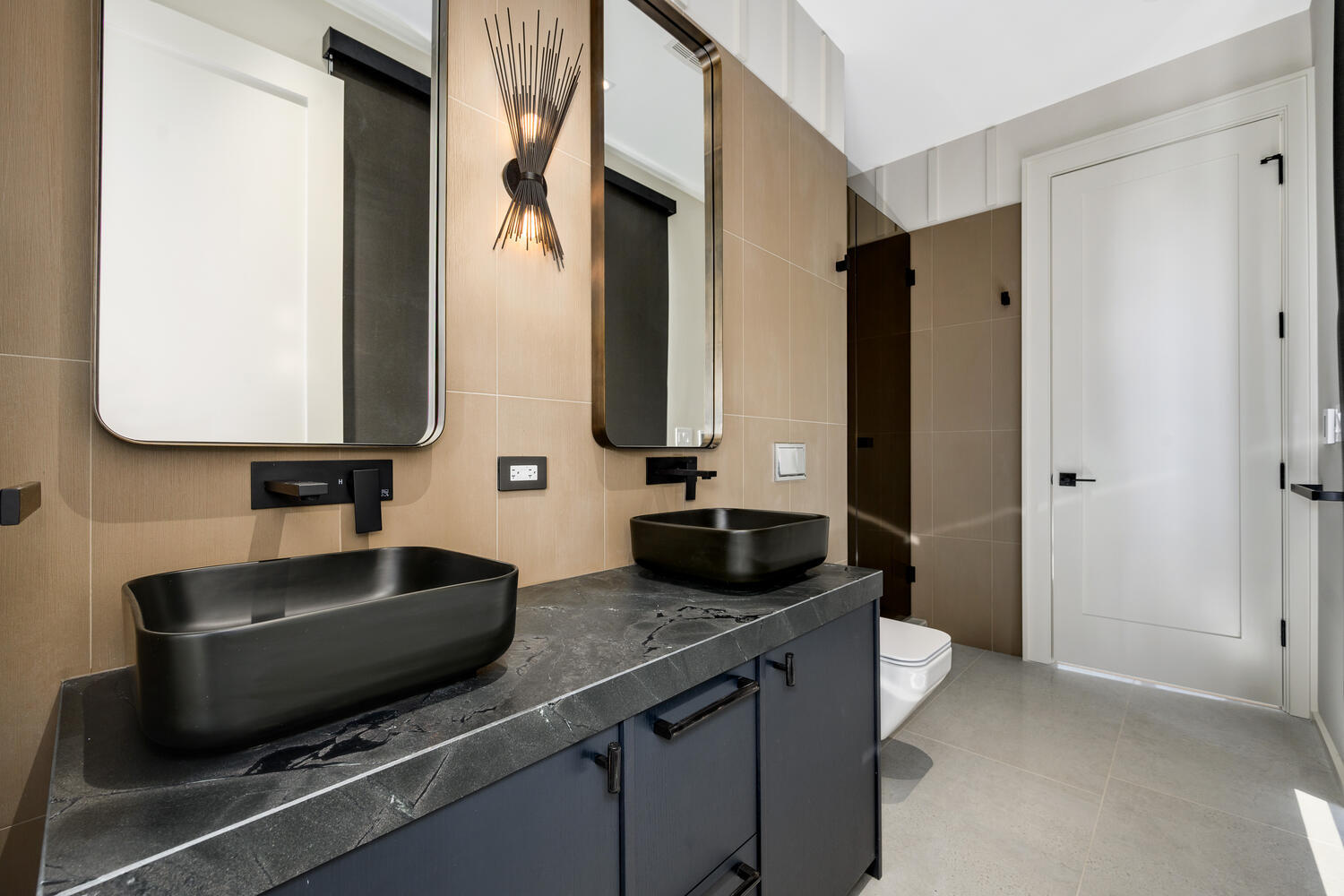 921 Sheridan Road Glencoe, IL 60022 - Photo 26 of 51 a bathroom with a granite countertop sink and a mirror