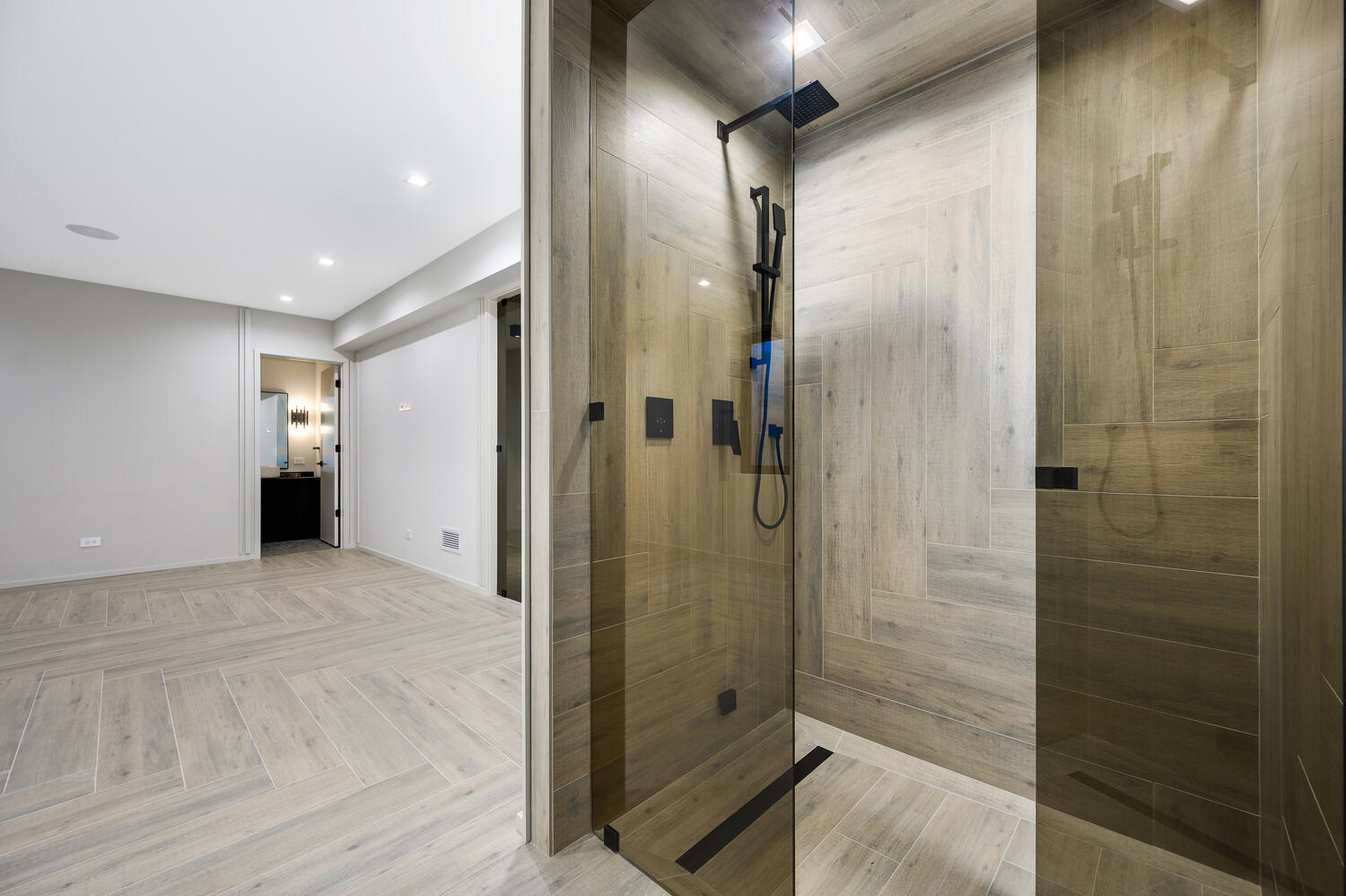 921 Sheridan Road Glencoe, IL 60022 - Photo 34 of 51 a bathroom with a shower and a glass door