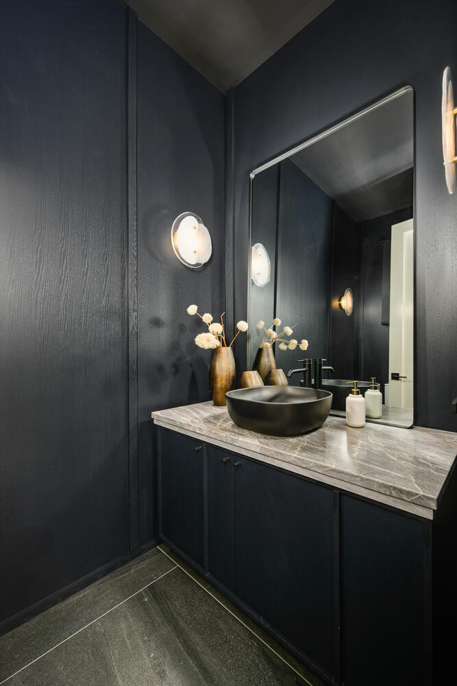 921 Sheridan Road Glencoe, IL 60022 - Photo 48 of 51 a bathroom with a double vanity sink and a mirror