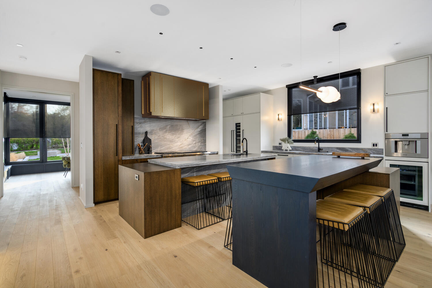 921 Sheridan Road Glencoe, IL 60022 - Photo 7 of 51 a kitchen with stainless steel appliances granite countertop a sink a stove and a refrigerator