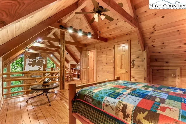 a view of a park with large trees