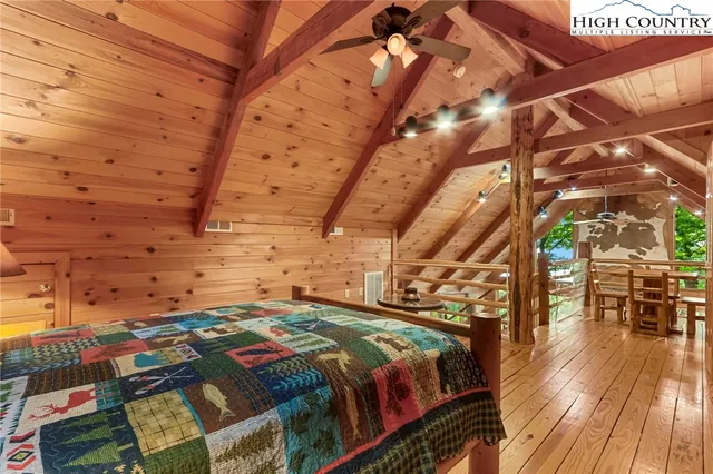 an aerial view of residential house with outdoor space and trees