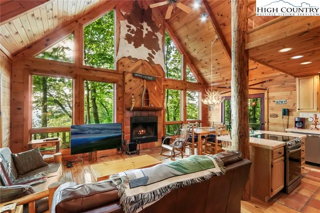 a bedroom with a bed and a large mirror on dresser