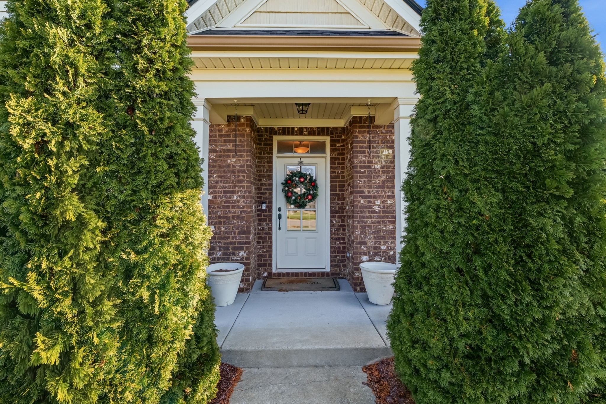 a front view of a house with a porch