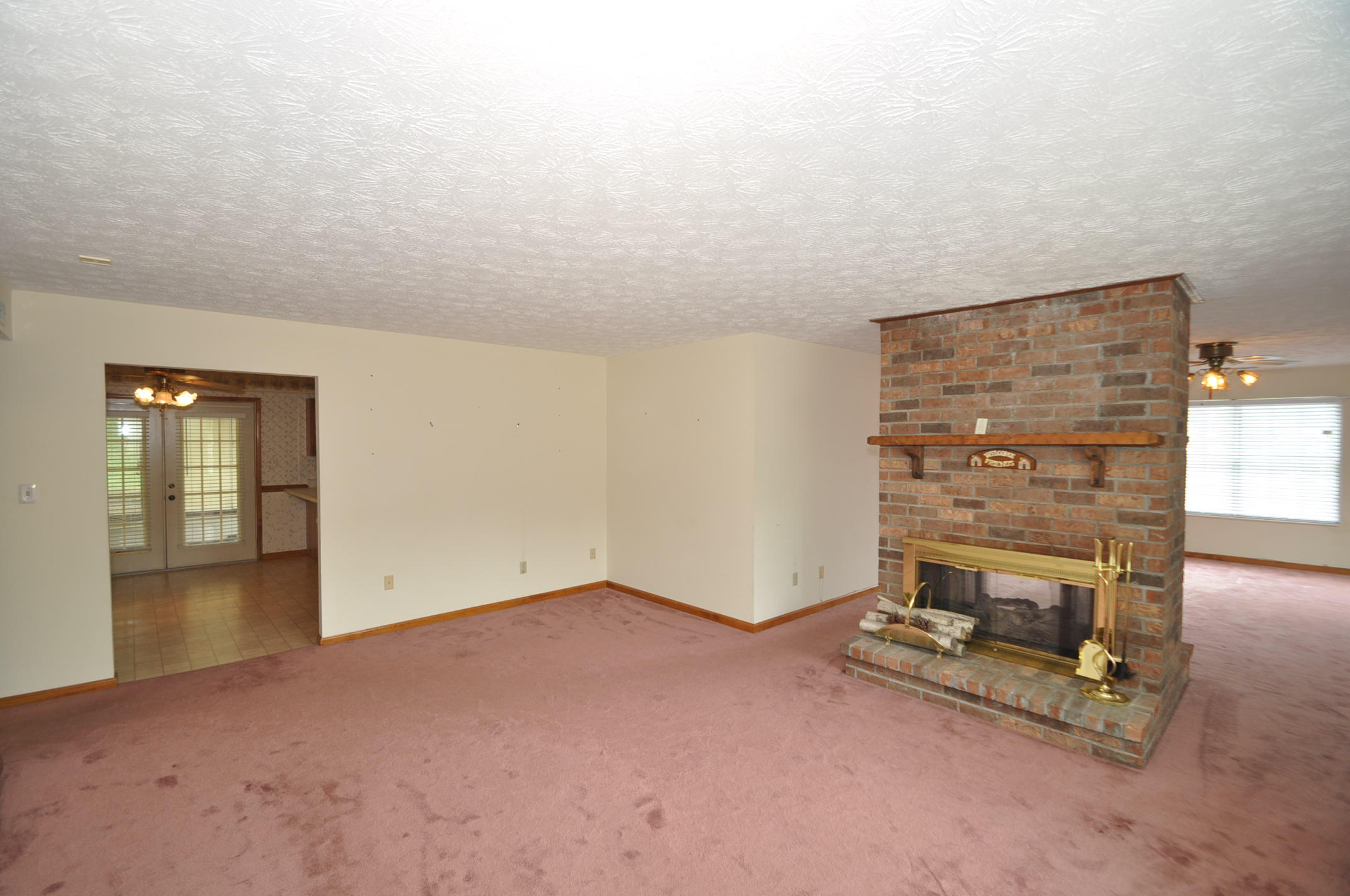 Living Room With Double Sided Fireplace