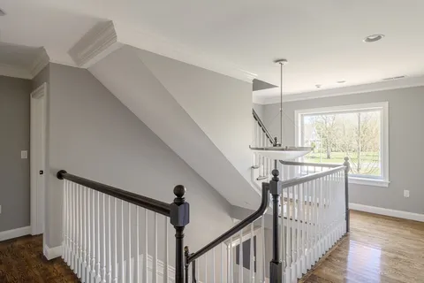 a bedroom with a bed and a table in it
