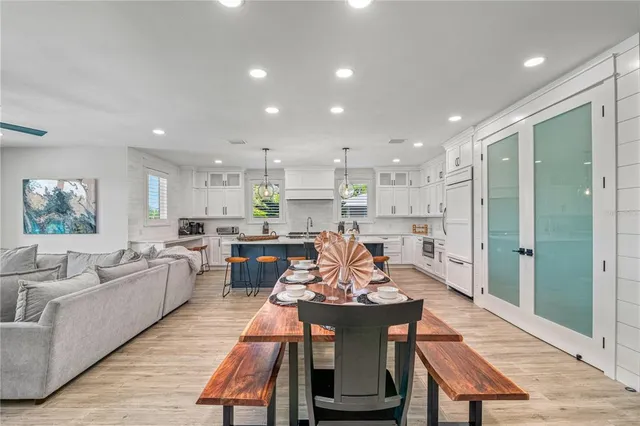 a bathroom with a sink toilet vanity and shower