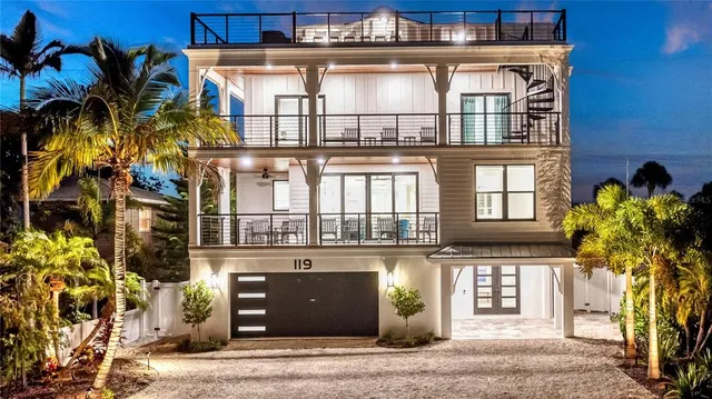 a view of a hallway with wooden floor and closet